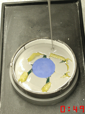 Investing of Ti-Light patterns in a metal ring for Cast by Ti-Research